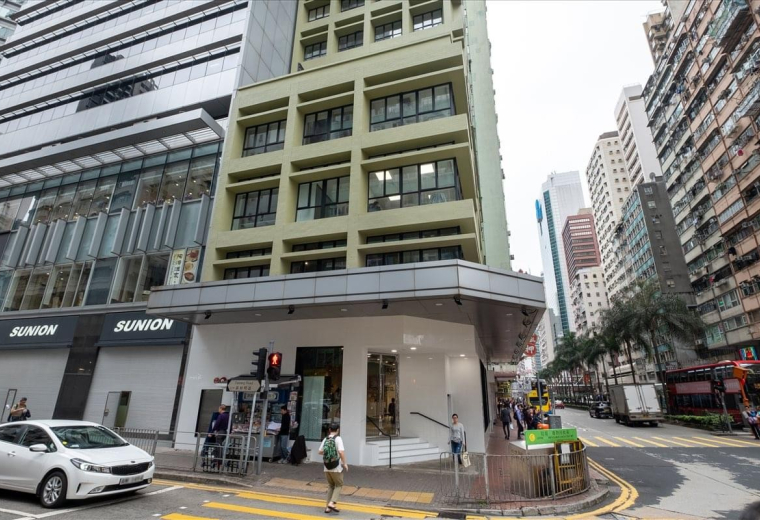 Exterior view of the green and grey facade at 200 Hennessy Road.