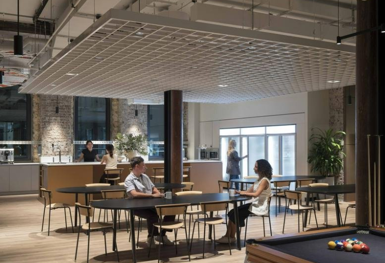 Large communal breakout area with a pool table and café seating at 32 York Street.