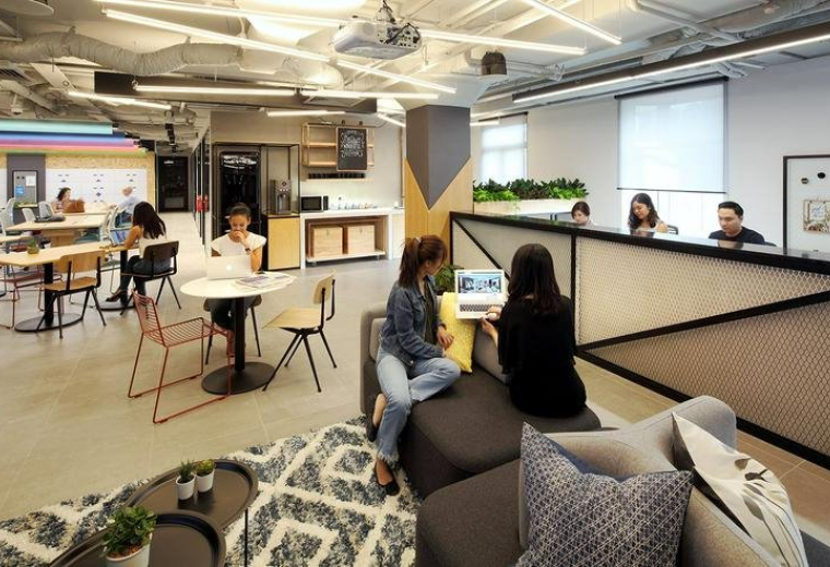 Spacious, modern coworking lounge at 40A Orchard Road, No. 03-01 with natural light and varied seating areas.