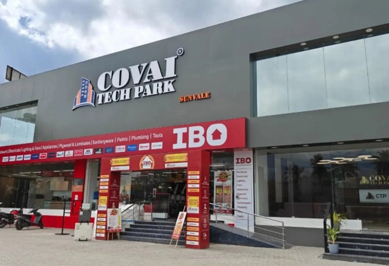 Exterior view of the Covai Tech Park building featuring its modern grey facade and entrance.