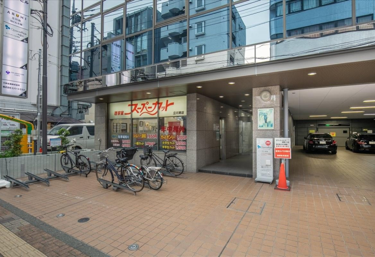 Ground level exterior and entrance of the TSC Building in Tachikawa-shi.