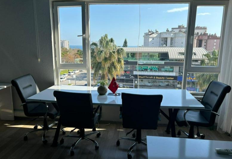Meeting room at Çağlayan Mahallesi, 2043. Sokak No:1 with a large window overlooking the city and sea.