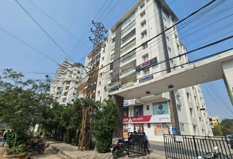 Exterior view of the Apurupa Urban building with modern facade and entrance gate.