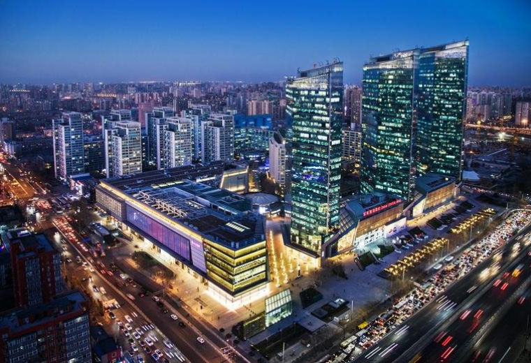 Aerial twilight view of the modern glass-facade towers at China Central Place, 79 Jianguo Road.