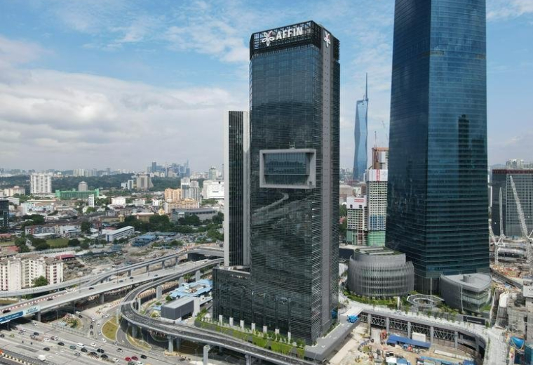 Exterior view of the modern glass-facade Menara Affin skyscraper.
