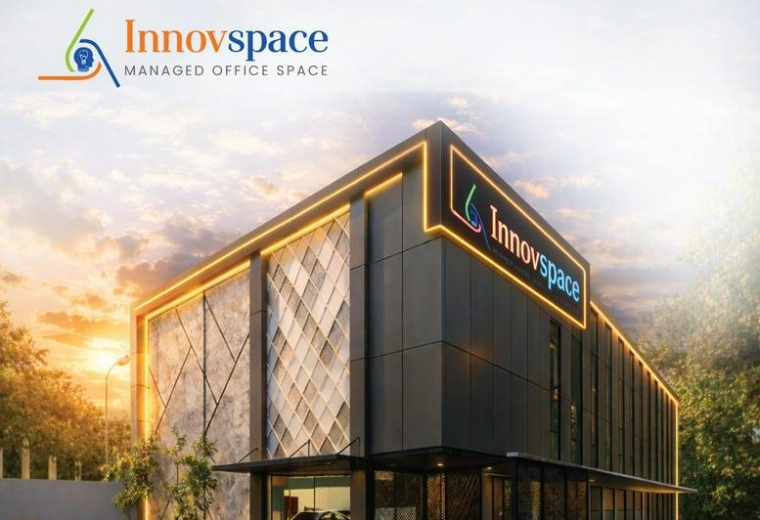 Exterior view of the modern black and gold facade at Innovspace in Coimbatore.