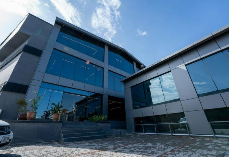 Exterior view of the modern glass-facade Daftarkhwan | North building.