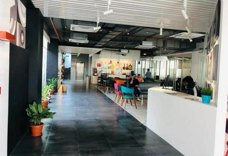 Spacious communal lounge and reception area at Redbrick House, N. T. R Pride Building.
