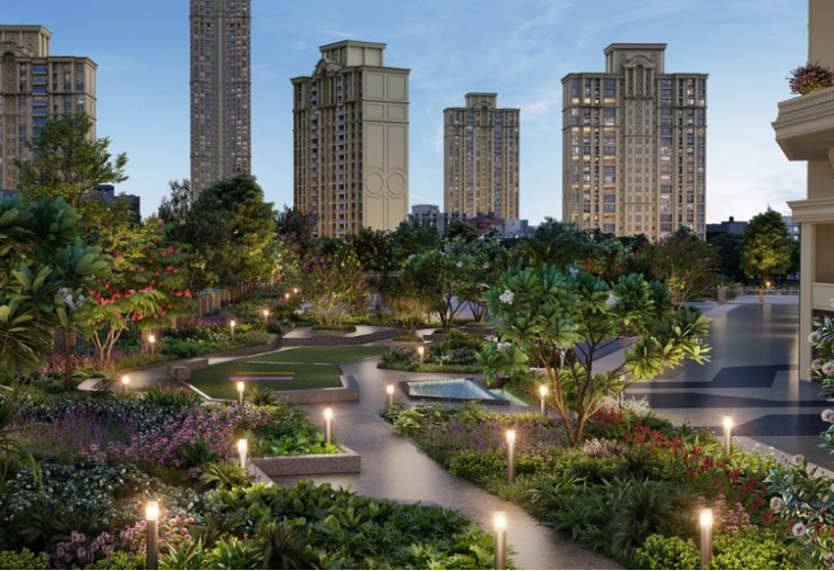 Landscaped garden pathways with warm lighting and greenery at Redbrick Offices, Centaurus, Hiranandani Business Park.