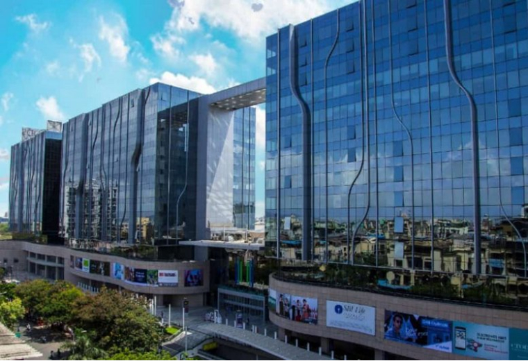 Exterior view of the modern glass facade at Redbrick Offices, L&T Seawoods, Seawoods Grand Central.