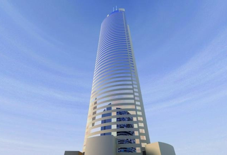 Exterior view of the soaring glass facade of Tamkeen Tower.