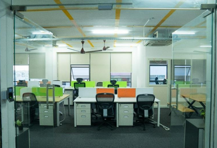 Wide view of the modern open-plan office space at VB Arcade, F Empyloyees Layout 131, 10th Cross Rd.