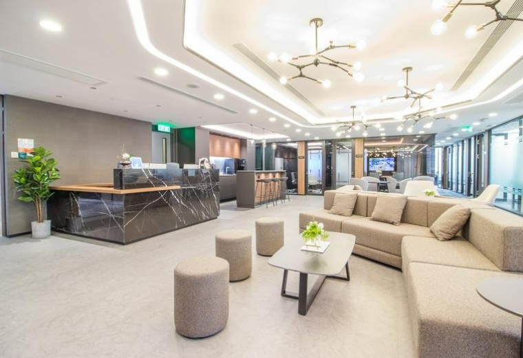 Spacious reception area with marble desk and designer lighting at Samsung Hub, 3 Church Street.