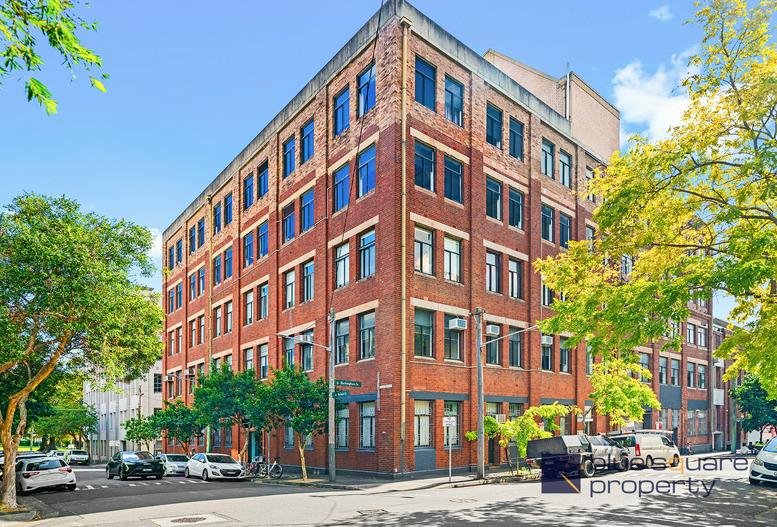 Exterior view of the red brick industrial building at 11-17, Buckingham Street.