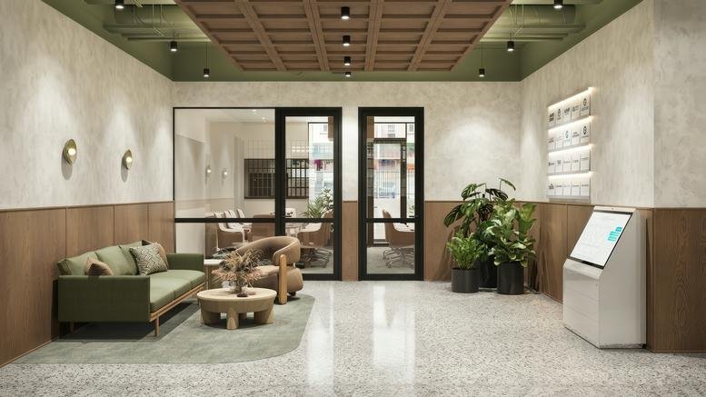 Lobby and reception lounge area at 116, Martin Street, Brighton featuring a green sofa and timber accents.