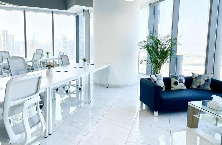 Exterior view of 2312 Addax Tower with glass facade and cityscape in the background.