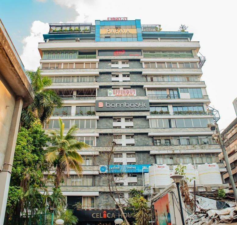 Exterior view of the green multi-story facade at 24, Park Street, Celica Park.