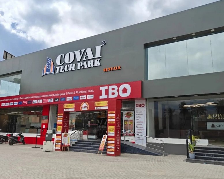 Exterior view of the Covai Tech Park building featuring its modern grey facade and entrance.