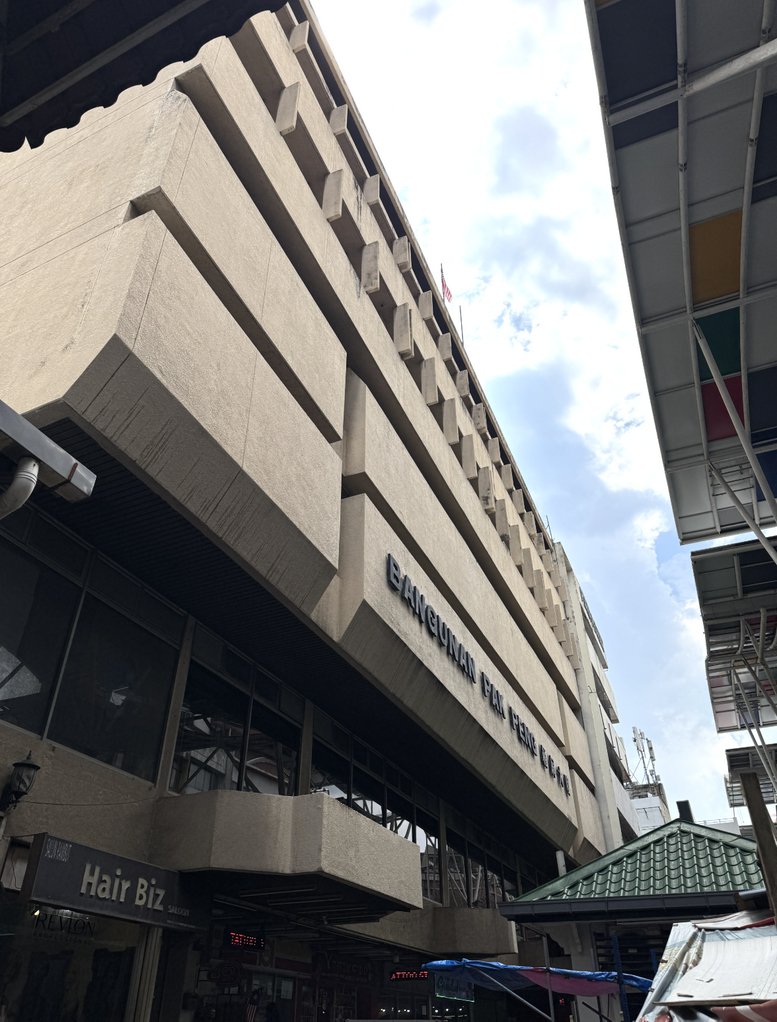 Exterior view of the multi-story concrete building facade at 69, Jalan Petaling.