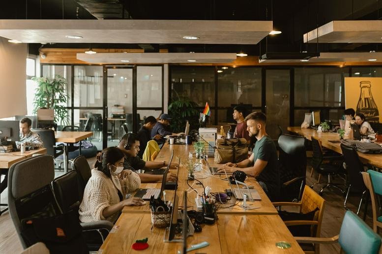 Spacious open-plan workspace at 6th Floor Mabuhay Tower IT Park featuring long wooden desks.