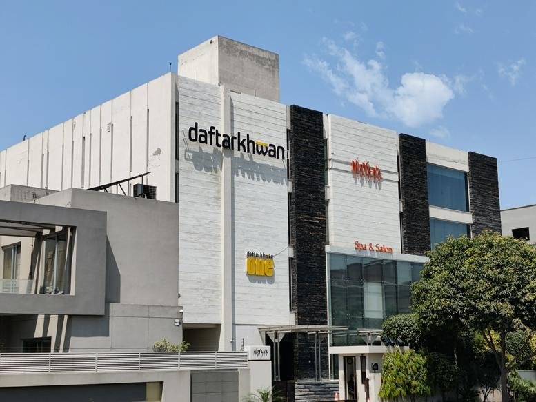 Modern multi-story exterior of Building no 254, 2nd Floor, Sector G, Phase 5 D. H. A with prominent signage.