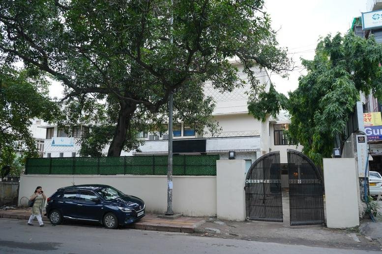 Exterior view of the white building at 11/4B Pusa Road, Opposite to Metro Pillar No 131.