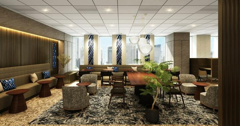 Spacious communal lounge with plush seating and city views at Nagoya Prime Central Tower 3F.