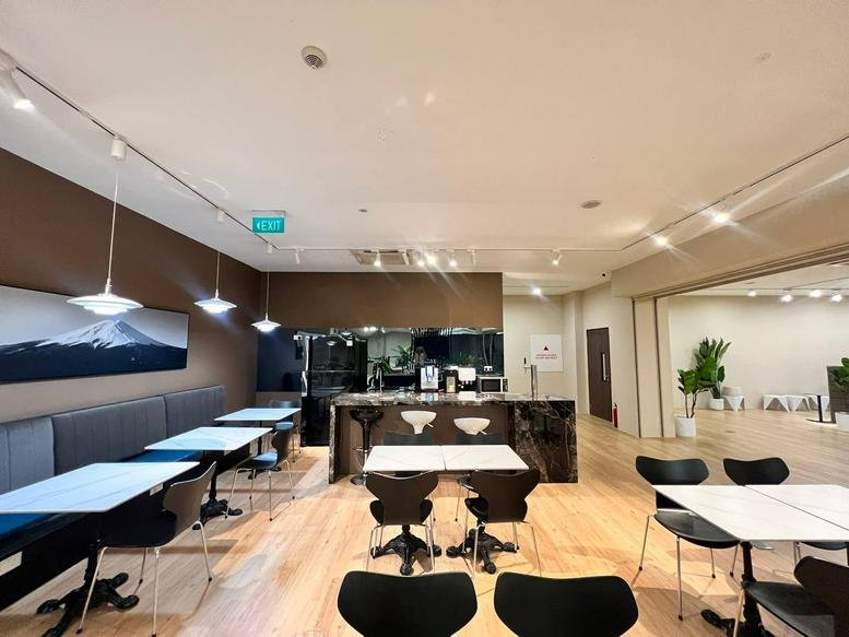 Spacious communal dining and kitchen area at 65 Mohamed Sultan Road, Singapore 239003, 4th Floor, SQ Collective.