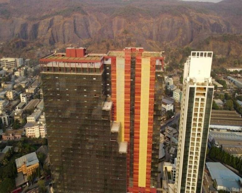 Exterior view of the multi-colored high-rise facade at Rupa Renaissance.