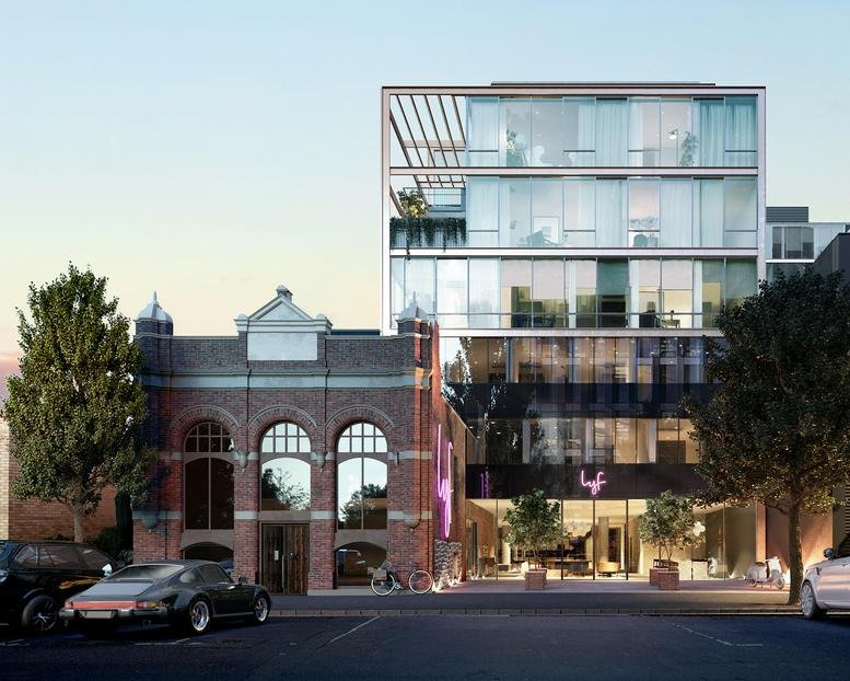 Exterior view of the glass-facade and brick building at Lyf Collingwood, 42 Oxford Street, Collingwood, Melbourne.