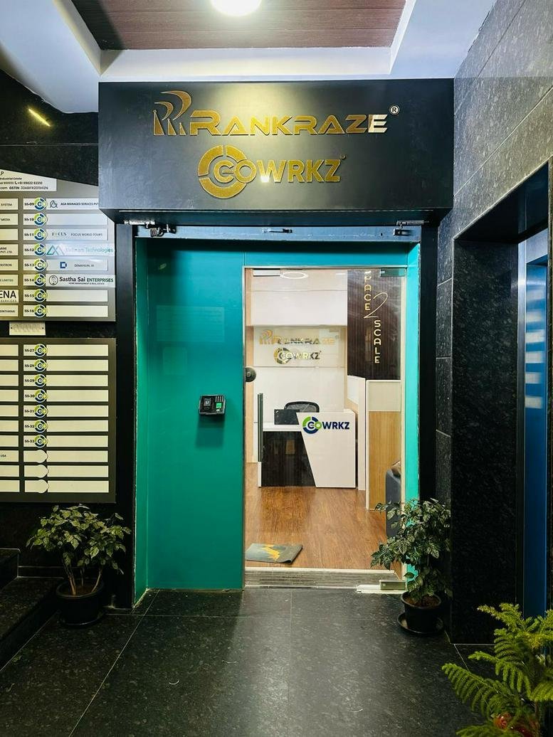 Entrance to the Sai Supreme office building at No: 28 with a bright teal accent wall.