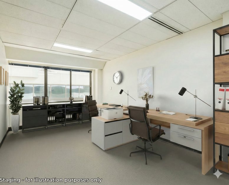 Exterior entrance of Central Law Courts building with glass facade.