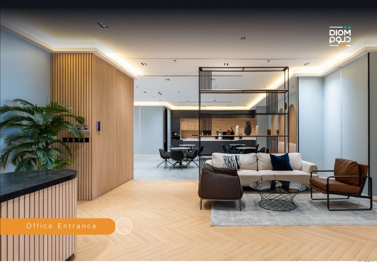Wood-paneled office entrance for DIOM HQ Century Corner with a reception desk and potted plant.
