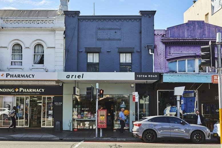 Exterior view of the blue and white facade of Level 2, 326 Oxford St, Paddington.