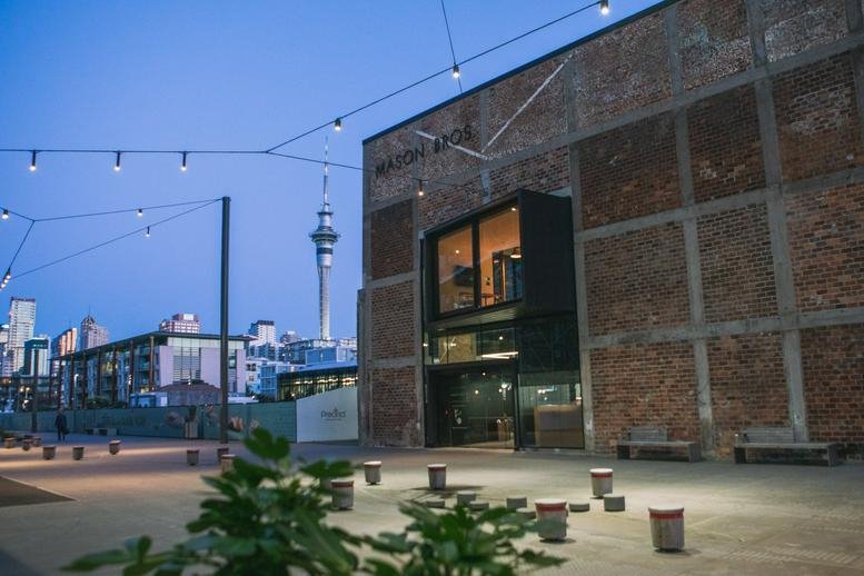 Exterior view of the brick facade and modern entrance at 12 Madden Street.