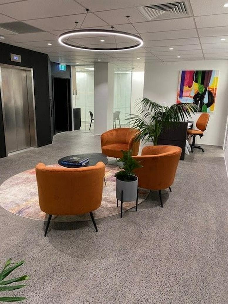 Spacious reception area at Building 10 Level 3, 666 Great South Road with modern ring lighting.
