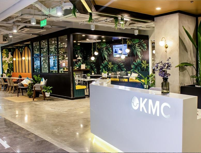 The modern lobby and branded reception desk at Armstrong Corporate Center.