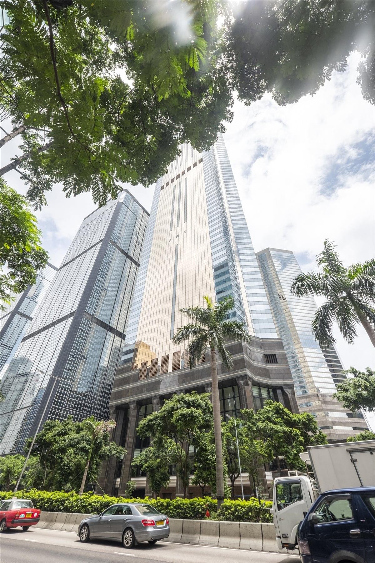 Exterior view of the towering glass and steel skyscraper of Central Plaza.