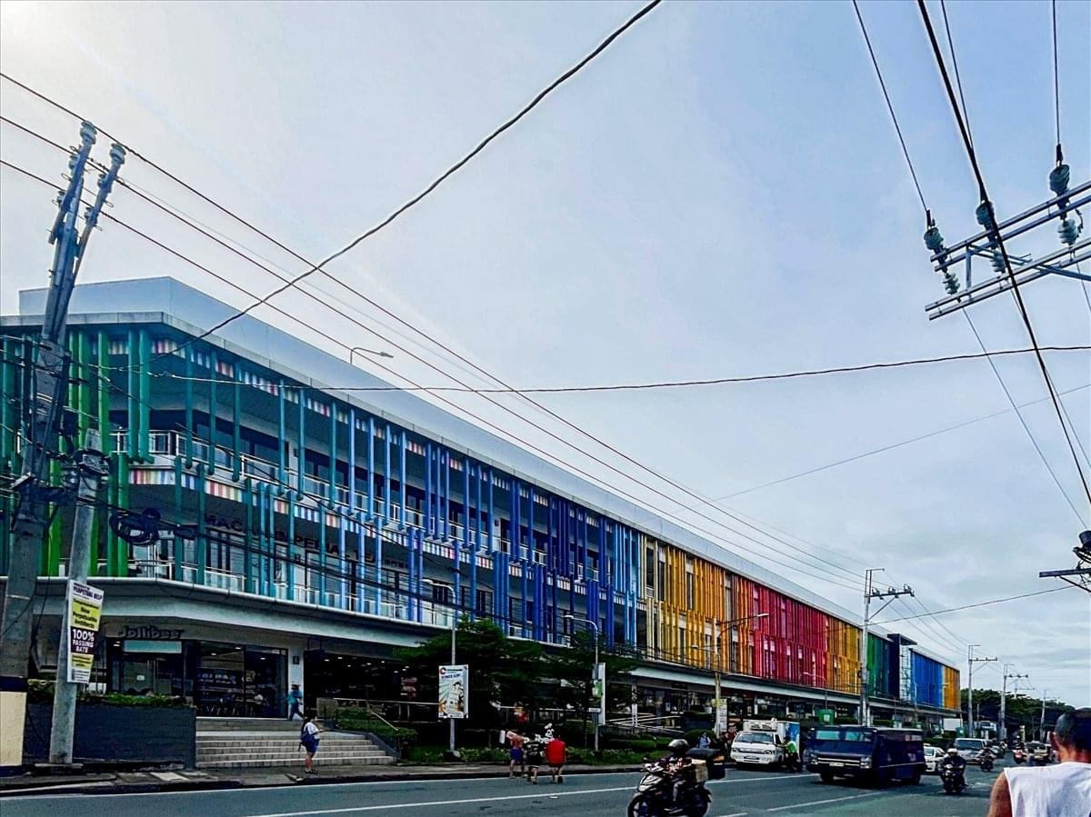 Exterior view of the colorful multi-story facade at Colours Town Center.