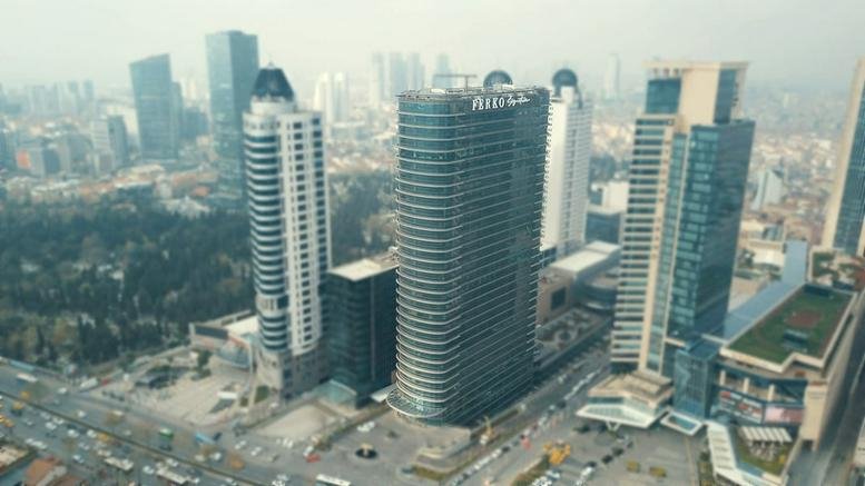 Exterior view of the contemporary high-rise glass towers of Ferko Signature.