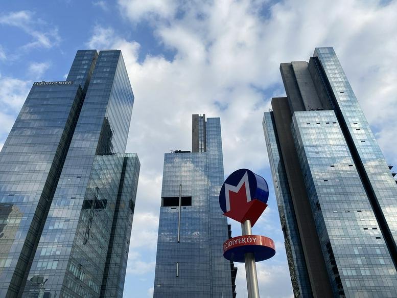 Exterior view of the glass-facade towers at Torun Center.