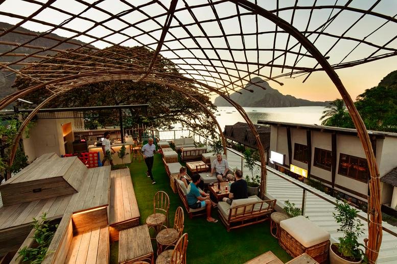 Aerial exterior view of the rooftop terrace and building at Hama Street, Unit 7, Town Sq, Calle Hama, El Nido.