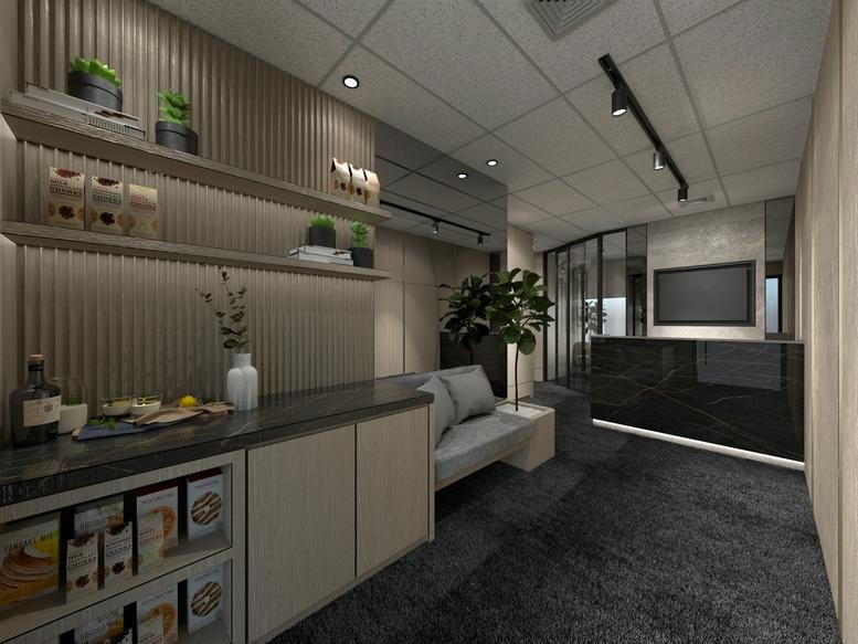 Sleek reception area at Jalan Harbour Bay, Batam featuring a dark marble desk and wood-slat feature walls.