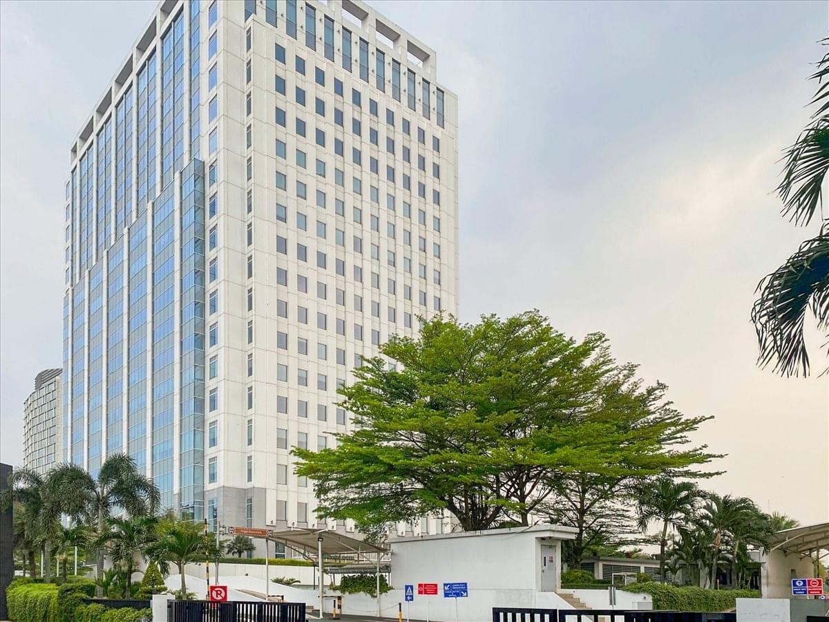 Exterior view of the white high-rise glass building at Jl. TB Simatupang.