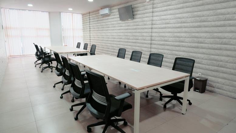 Spacious meeting room at Jln. Raya Jemursari No. 76 D09, Wonosari, Surabaya with modern conference tables.