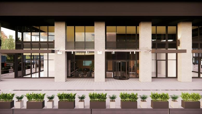 Exterior view of the modern stone and glass facade at Nidya Center, Istanbul.