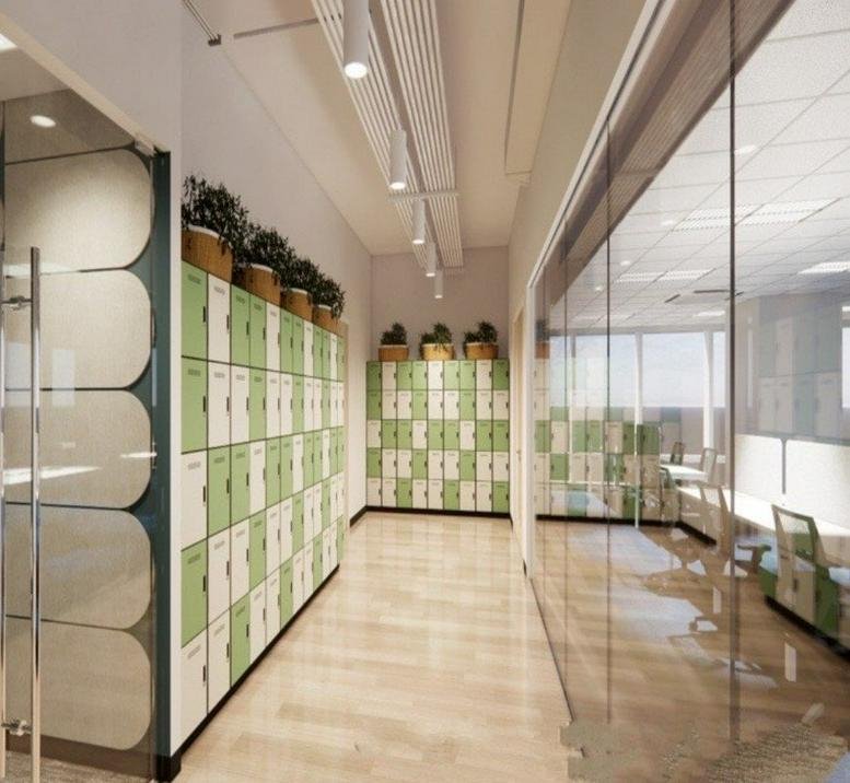 Corridor with colorful lockers and clear glass walls.