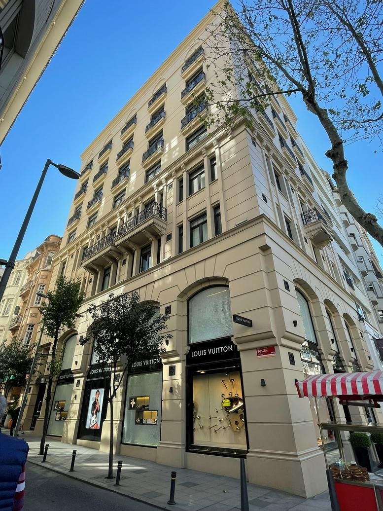 Orjin Is Hanı building facade with Louis Vuitton boutique on the ground floor.