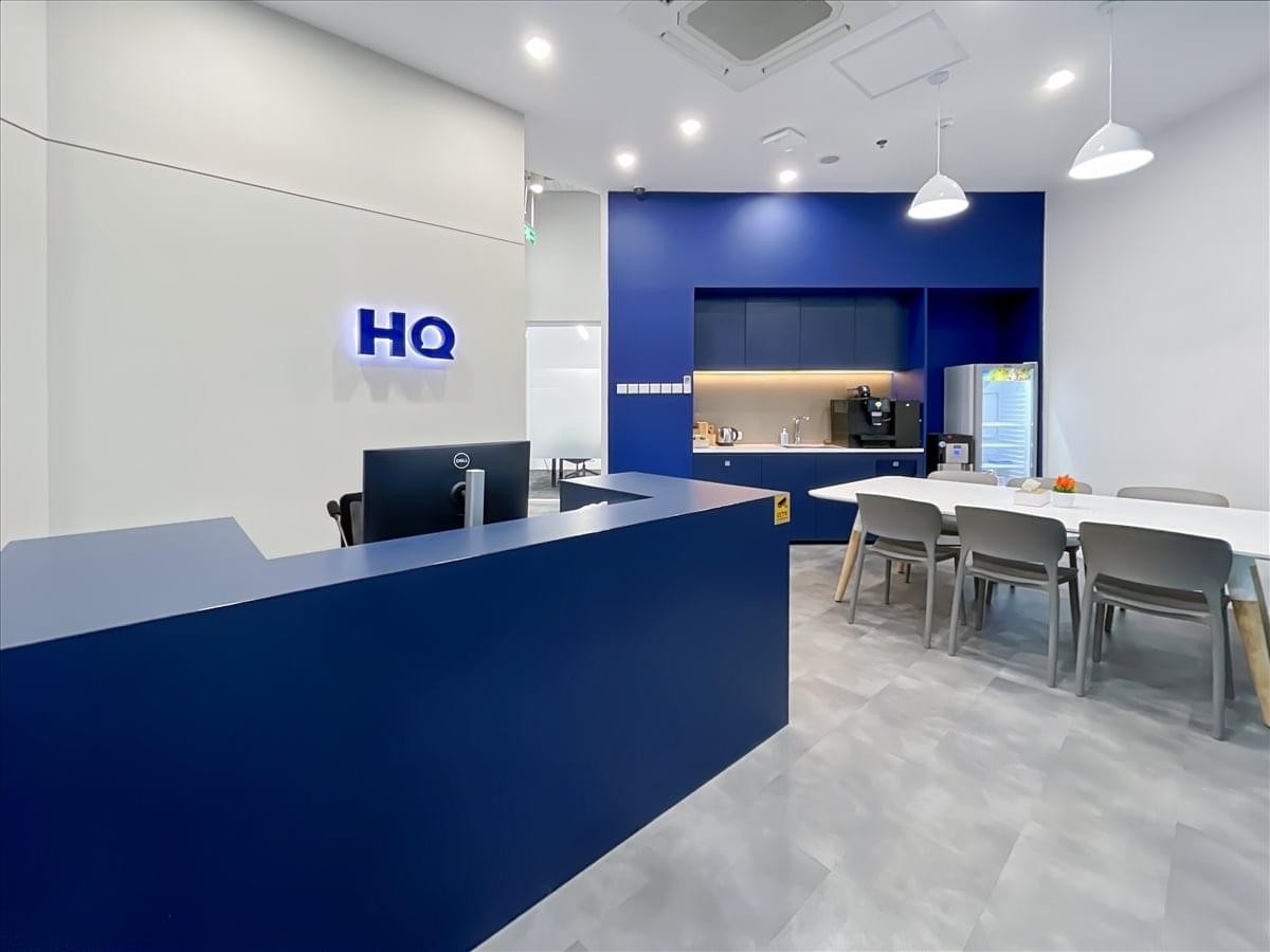 Branded reception area and communal dining space at Sunset Boulevard Street No. 16, Delft Apartment.