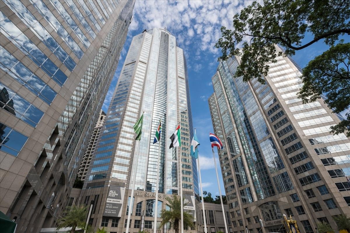 Exterior view of the soaring glass skyscrapers at CRC Tower, All Seasons Place.